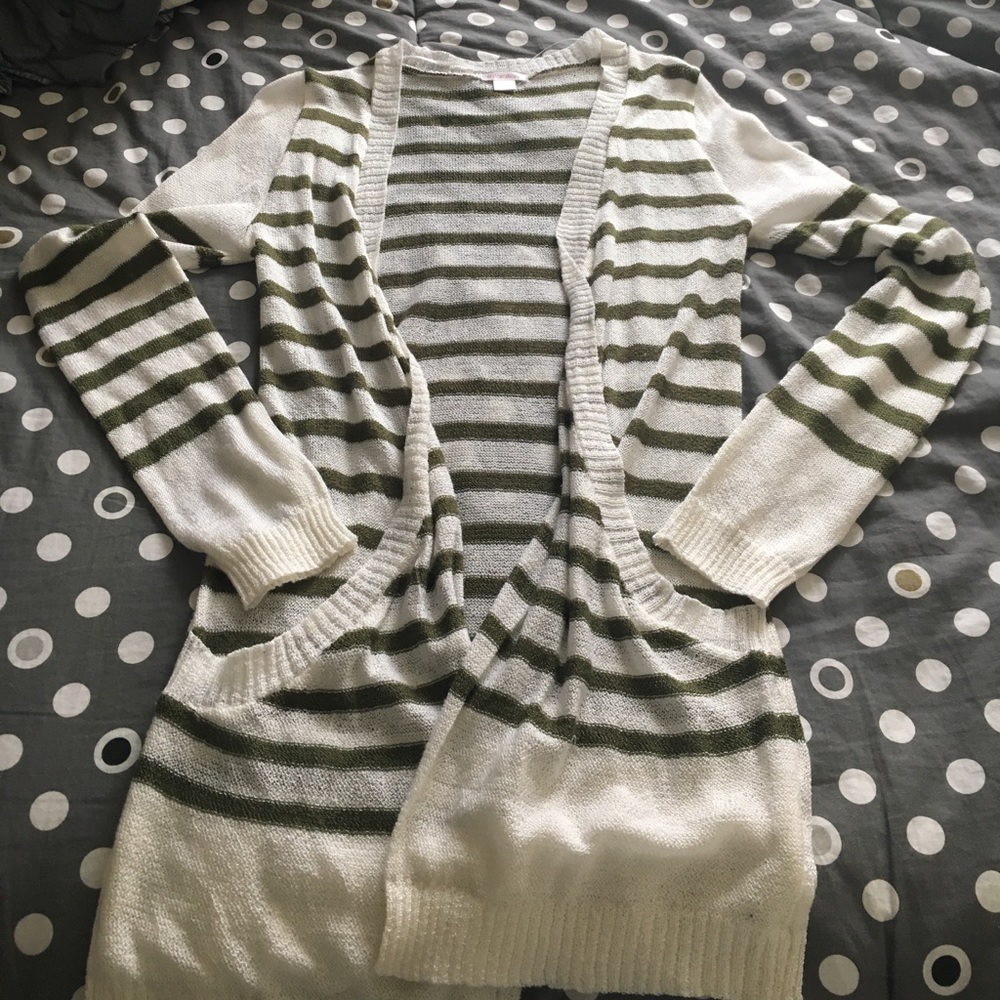 Cream and olive green cardigan.